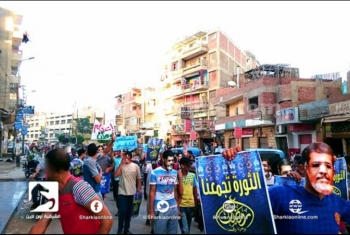  صور الرئيس مرسي تغزو شوارع منيا القمح