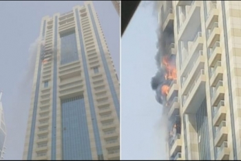  بالصور.. حريق ضخم في برج سكني بدبي